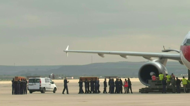 Bodies of Europeans killed in Burkina Faso arrive in Spain
