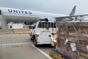 United Airlines' workers facilitate the first shipment of ventilators from Chicago to Delhi on Wednesday evening. The ventilators were donated by the US-India Chamber of Commerce in Dallas-Fort Worth.