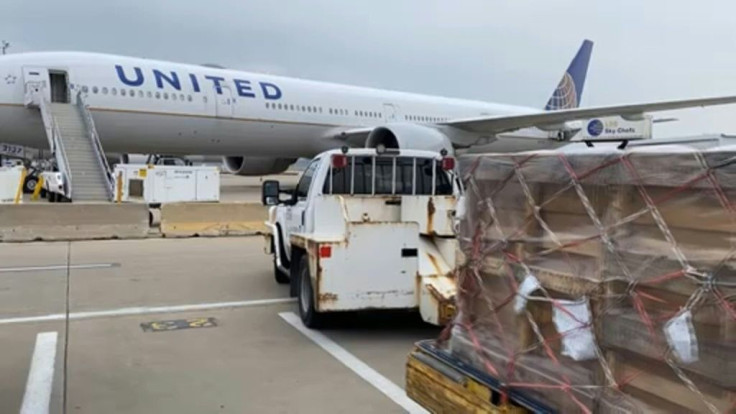United Airlines' workers facilitate the first shipment of ventilators from Chicago to Delhi on Wednesday evening. The ventilators were donated by the US-India Chamber of Commerce in Dallas-Fort Worth.