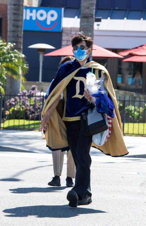 With California now boasting the nation's lowest per capita infection rate, Disneyland flung open its gates to the delight of many of its most obsessive devotees