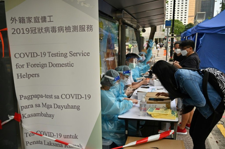 Hong Kong's domestic workers have been ordered to get tested over the coming days and told coronavirus vaccinations will be compulsory