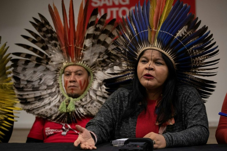 Brazilian indigenous leader Sonia Guajajara (R), seen at a news conference in Paris in 2019, says she is being investigated by police for allegedly 'slandering' the government over its coronavirus policies