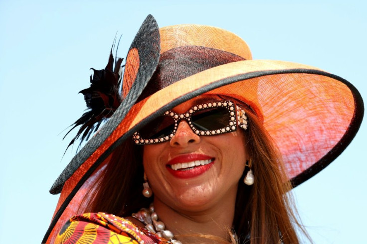 A spectator watches an undercard race prior to the 147th running of the Kentucky Derby at Churchill Downs on May 01, 2021 in Louisville, Kentucky