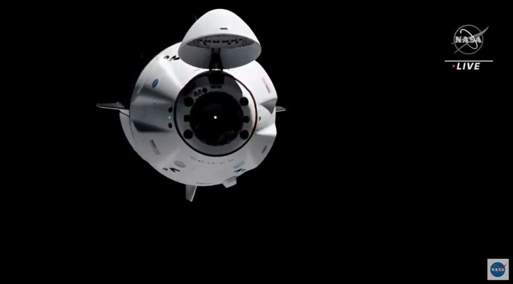 This screen grab taken from a NASA live feed shows the SpaceX's Crew Dragon spacecraft approaching the International Space Station on April 24, 2021