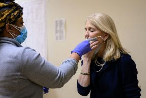 Actress Catherine Russell receives a Covid-19 test prior to performing in New York's longest-running play 'Perfect Crime'
