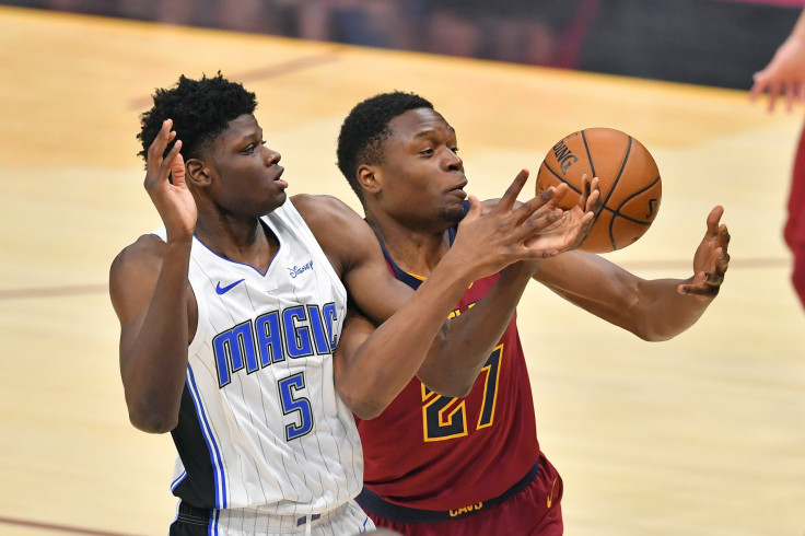 Mo Bamba #5 of the Orlando Magic fights for a rebound with Mfiondu Kabengele #27 of the Cleveland Cavaliers
