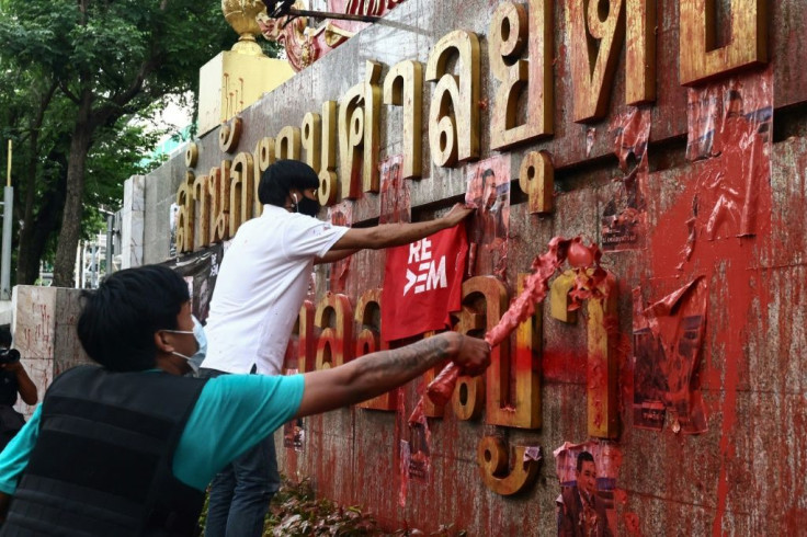 Pro-democracy protesters sloshed red paint all over the court's entrance