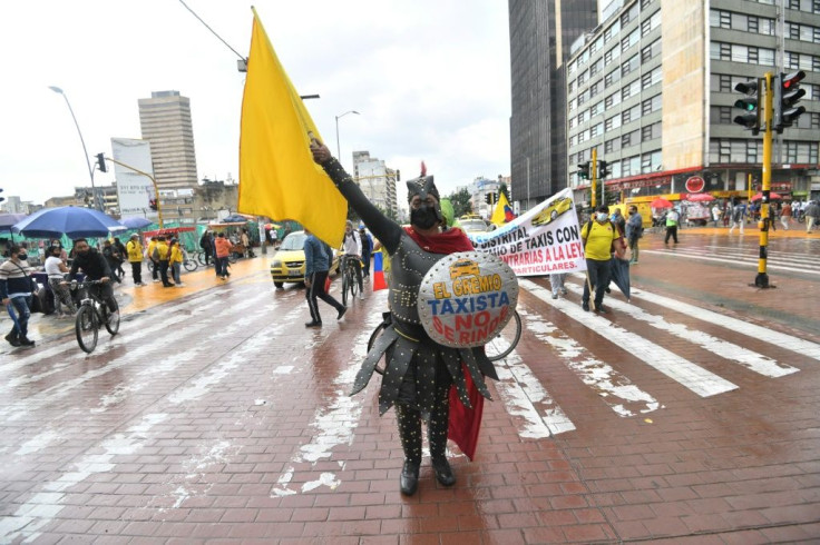 Taxi drivers protest against a tax reform bill launched by President Ivan Duque, in Bogota on May 3, 2021
