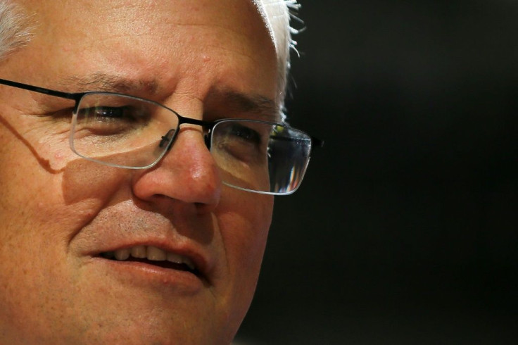 Australia's Prime Minister Scott Morrison was accused of racism and having blood on his hands over a threat to jail Australians trying to escape Covid-wracked India