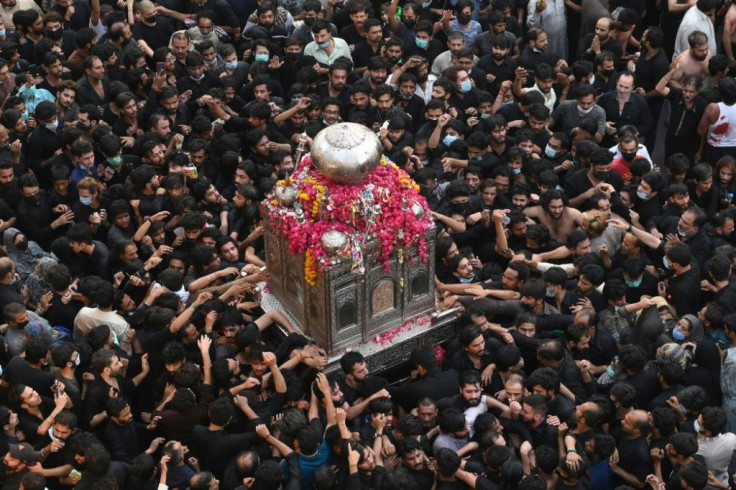 Despite coronavirus warnings, thousands of Shia Muslims â- many not wearing masks -- gathered in the eastern Pakistani city of Lahore for an annual religious procession