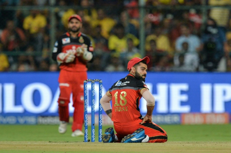 The IPL features the world's top players, including India captain Virat Kohli (R)