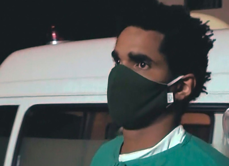 Cuban dissident artist Luis Manuel Otero Alcantara is seen being taken by medical personnel to the Calixto Garcia hospital in Havana on May 2, 2021