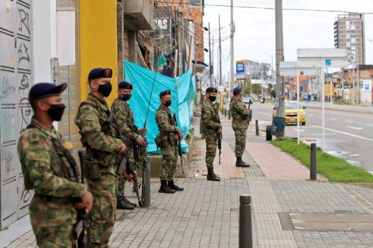 Soldiers patrol the streets in Colombia after anti-government demonstrations, sparking fears of militarization