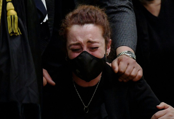 The victim's widow Rosa Maria Esilio bursts into tears after the court decision in the trial of two US citizens charged with murdering her husband, Italian Carabinieri paramilitary police officer Mario Cerciello Rega