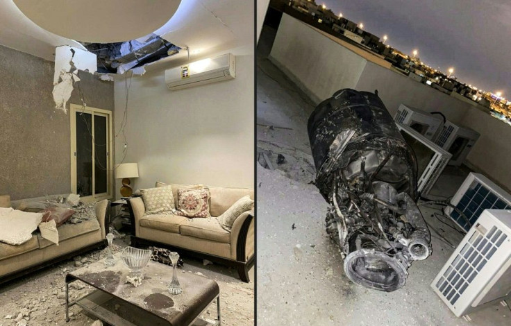 Damage to a home and debris on the roof of a building in Saudi Arabi's capital Riyadh in the aftermath of a missile attack claimed by Yemen's Huthi rebels in February 2021
