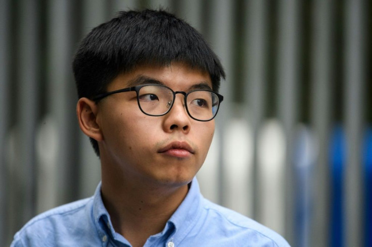 Jailed Hong Kong dissident Joshua Wong pleaded guilty taking part in an "unlawful" Tiananmen Square protest last year