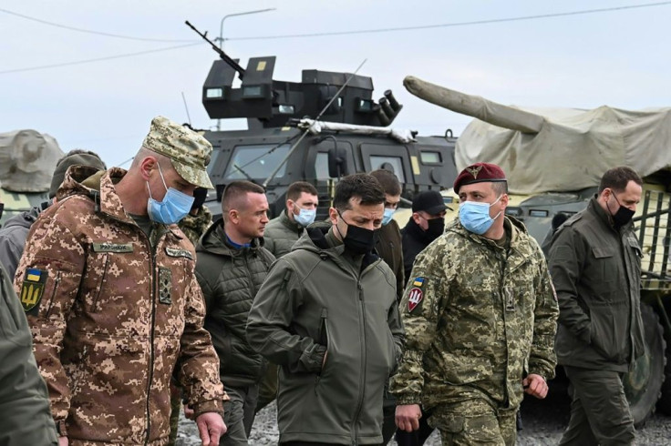 Ukraine's President Volodymyr Zelensky visits army outposts in the Kherson region, on the administrative border with Russia-annexed Crimea, on April 27, 2021