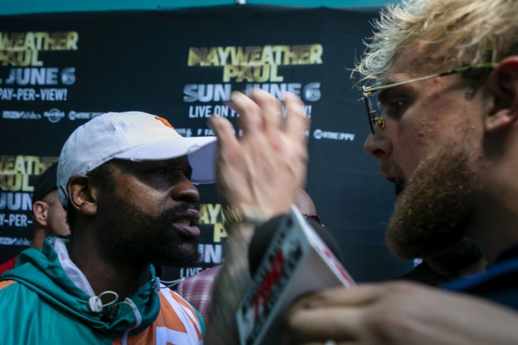 Tempers flare as Floyd Mayweather and Jake Paul confront each other during a media event for Mayweather's June 6 fight with Logan Paul in Miami on Thursday