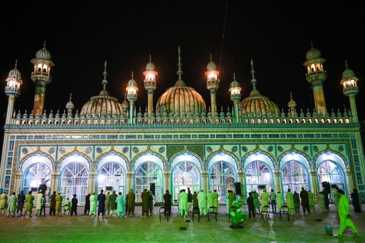 Devotees offer evening prayers at the Markazi Jamia mosque in Rawalpindi