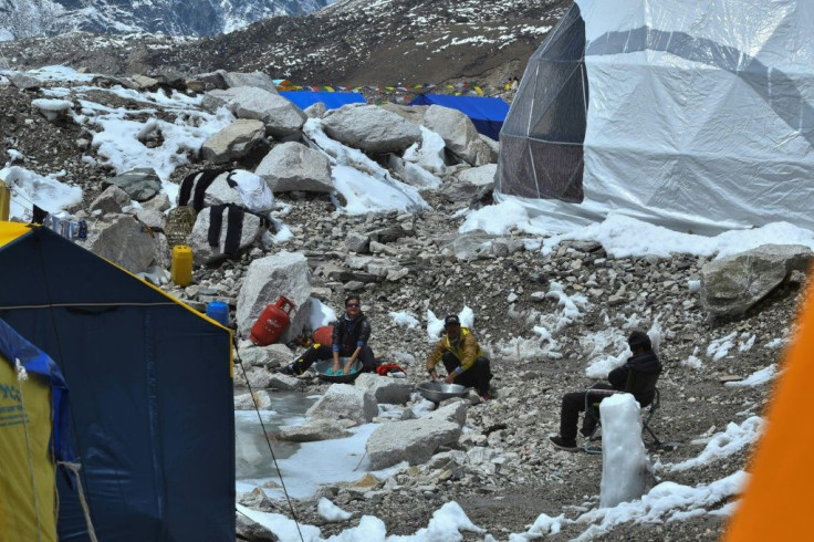 The warmer weather that ushers in safer conditions for scaling Nepal's dangerous, snow-capped peaks has coincided with a deadly second wave of Covid-19 infections, with active cases in the country rising six-fold in the last two weeks