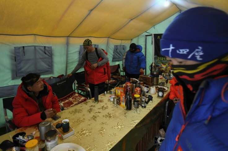 The usual reverie and loud communal parties at the base camp are absent this year after expedition groups were asked to keep to themselves and avoid socialising with others