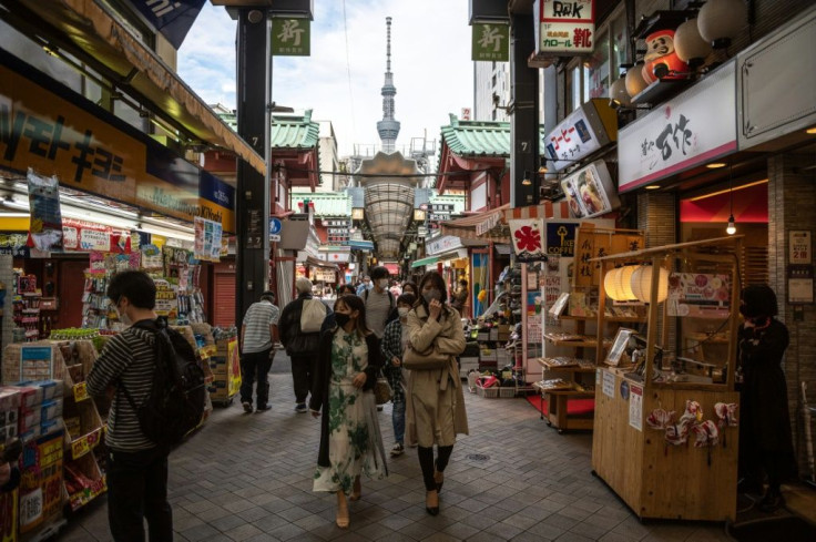 Japan has been forced to extend a virus state of emergency in Tokyo and other regions, with just three months to go until the Olympics