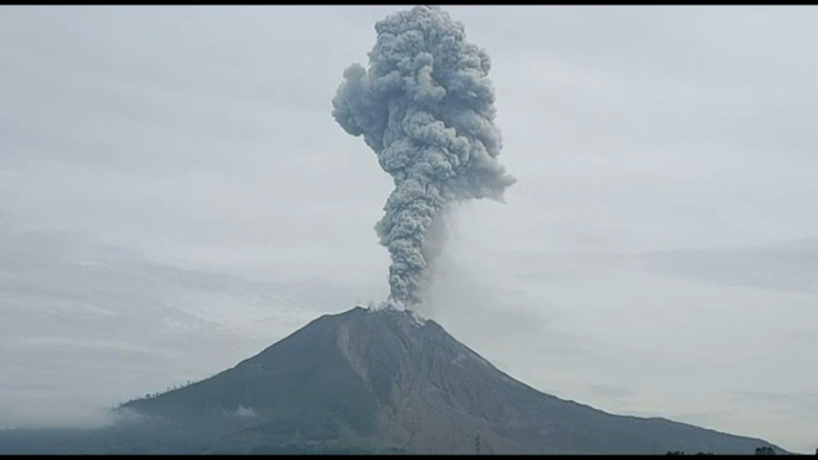 Mount Sinabung spews hot ash and smoke into the sky in Karo, North Sumatra in IndonesiaSinabung, a 2,460-metre volcano, was dormant for centuries before roaring back to life in 2010 when an eruption killed two people.After another period of inactivity