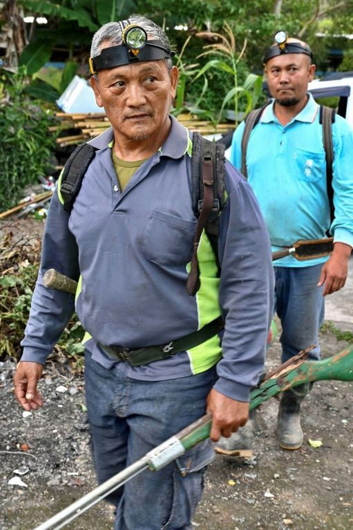 Indigenous hunter Tama Talum (L) faces the prospect of prison after Taiwan's Supreme Court ruling upheld his conviction