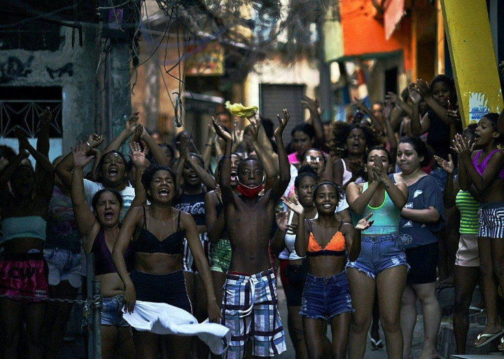 Residents protest after a police operation against alleged drug traffickers at the Jacarezinho favela in Rio de Janeiro state