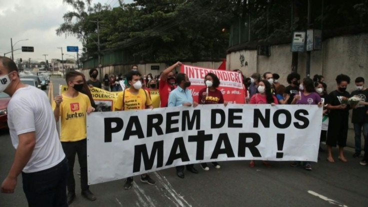 IMAGES AND SOUNDBITESPeople protest in Jacarezinho, a favela in Rio de Janeiro, a day after a massive police operation against drug traffickers left 25 people dead.