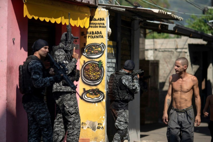 Civil Police officers take part in an operation against alleged drug traffickers at the Jacarezinho favela in Rio de Janeiro, Brazil, on May 06, 2021