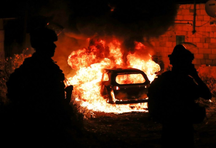 Palestinian protesters clash with Israeli police in the Sheikh Jarrah neighbourhood of annexed east Jerusalem where land disputes between Palestinians and Jewish settlers have fuelled hostility for years