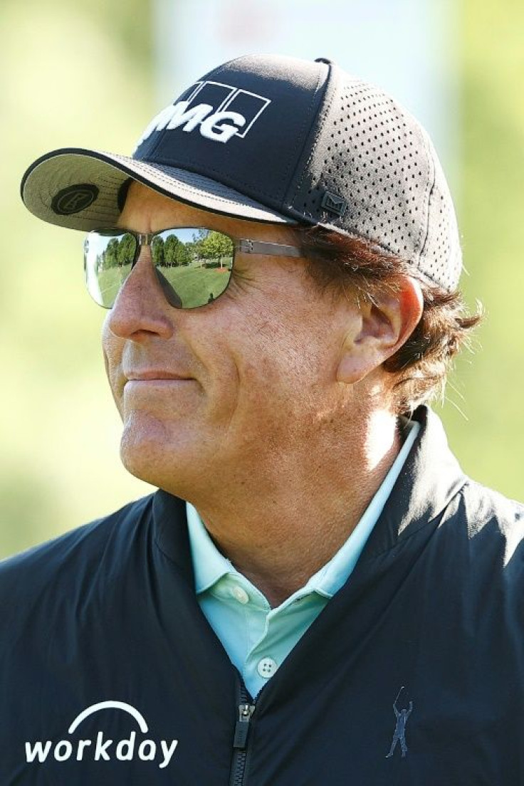 American Phil Mickelson remains in contention in the US PGA Tour Wells Fargo Championship despite a second-round 75 that was 11 shots worse than his opening effort