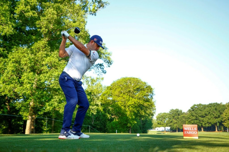 American Gary Woodland has a share of the 36-hole lead along with Matt Wallace and Patrick Rodgers at the US PGA Tour Wells Fargo Championship