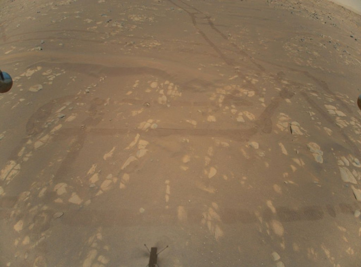 NASA photo shows the first color image of the Martian surface taken by an aerial vehicle