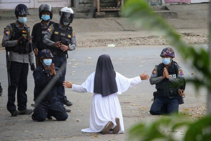 The image of Sister Ann Rose Nu Tawng kneeling in the dust, arms spread, begging police not to shoot "the children" went viral in March as an uprising swelled in Myanmar