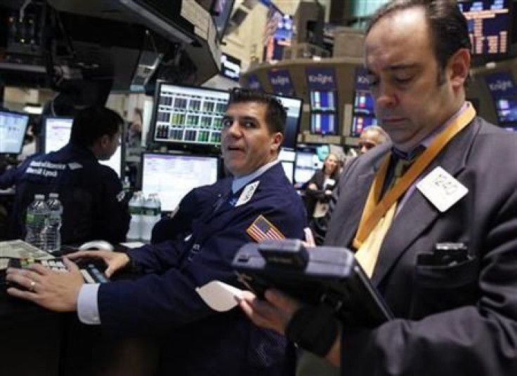 Traders work on the floor of the New York Stock Exchange