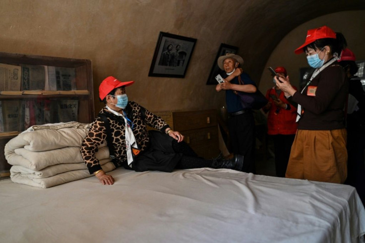 This picture taken during a government-organised media tour shows tourists at the former residence of Mao Zedong in Yan'an, the headquarters of the Chinese Communist Party from 1936 to 1947