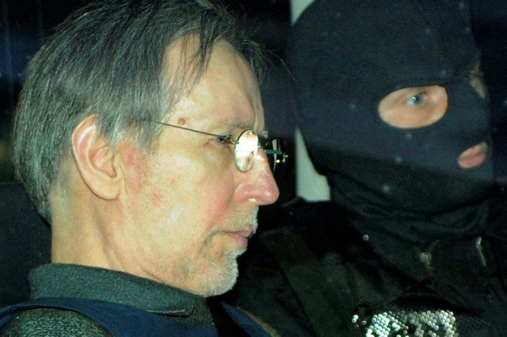 Dead: French serial killer Michel Fourniret (L) seen here arriving at court