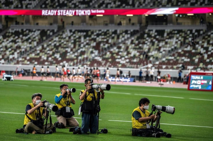 Athletes ran to an eerily empty stadium at a test event in Tokyo ahead of the Summer Olympics