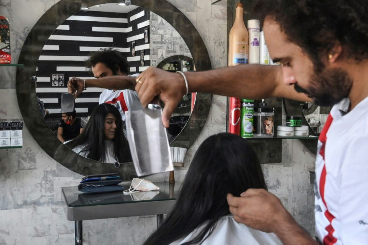 Abbas's fringe style is proving a hit in the conservative nation, with customers flocking to his shop in the eastern city of Lahore