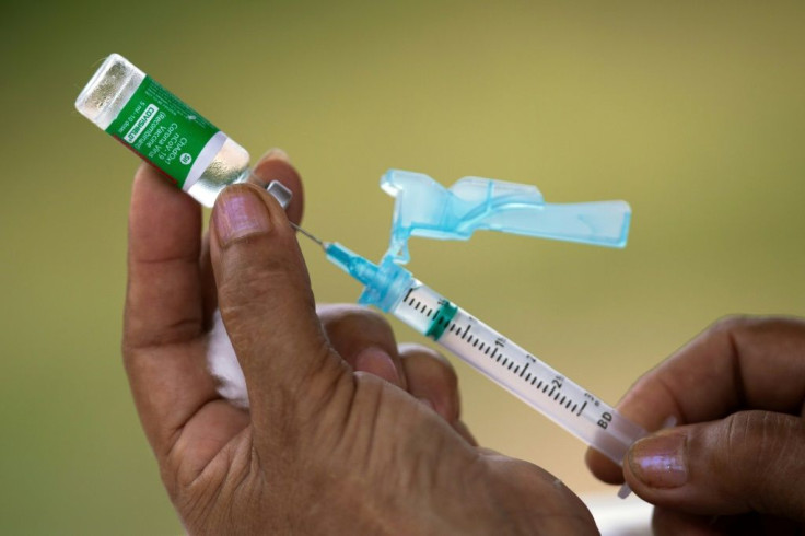 Nurse Janete Da Silva Oliveira prepares a dose of Oxford-AstraZeneca Covid-19 vaccine in the Nossa Senhora Livramento community on the banks of the Rio Negro, near Manaus, Amazonas state,  Brazil February 09, 2021.