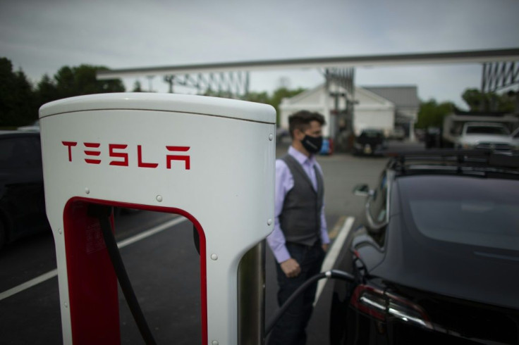 A Tesla vehicle at a super charging station in Parsippany, New Jersey on May 06, 2021: studies show that many public charging stations are under-used, as most EV owners charge their cars at home or work