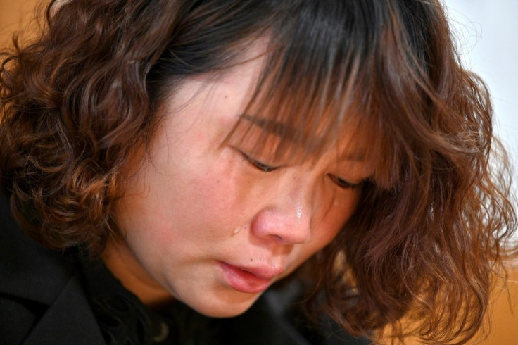 Lihong Wei has been left unsure how she can support her elderly parents and two children since her husband Xiaojun Chen was killed after colliding with a bus while delivering food