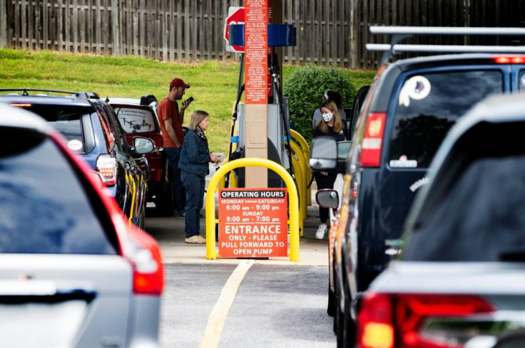 Stations with fuel in their tanks saw long lines of motorists rushing to fill up amid the Colonial Pipeline shutdown