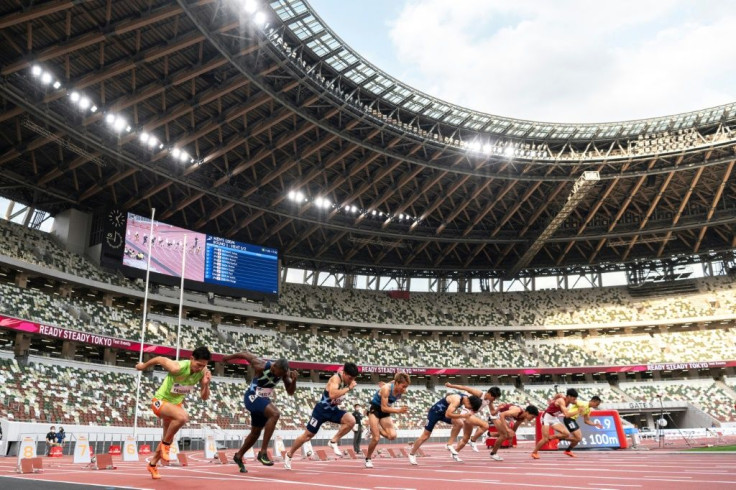 American sprinter Justin Gatlin (2nd L) took part in an athletics test event in Tokyo at the weekend