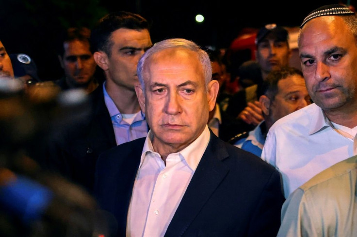 Israeli Prime Minister Benjamin Netanyahu tours the city of Lod early on May 12