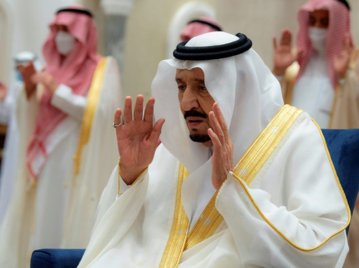 King Salman of Saudi Arabia takes part in prayers for the Eid al-Fitr holiday marking the end of the Muslim fasting month of Ramadan