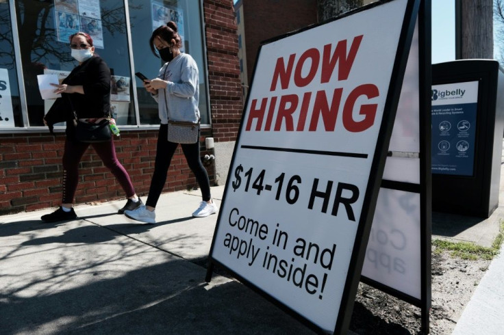 A company advertises a help wanted sign in Pawtucket, Rhode Island in April