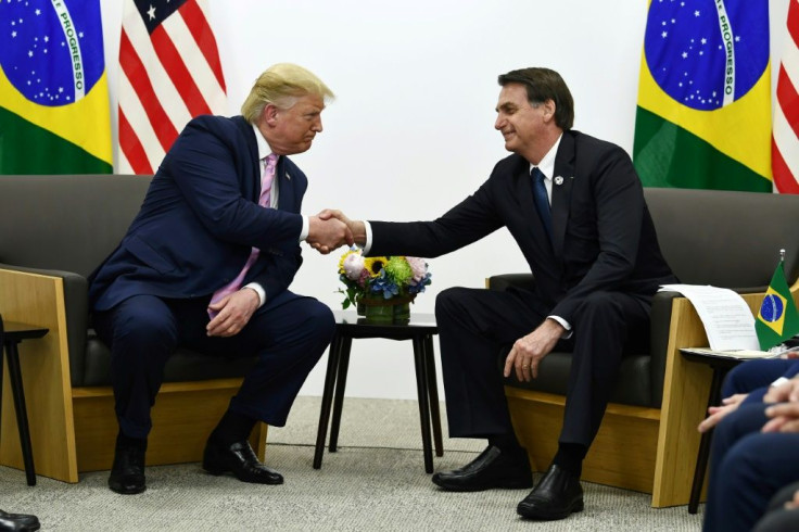 Brazil's President Jair Bolsonaro (R) meets with US President Donald Trump during a bilateral meeting on the sidelines of the G20 Summit in Osaka on June 28, 2019